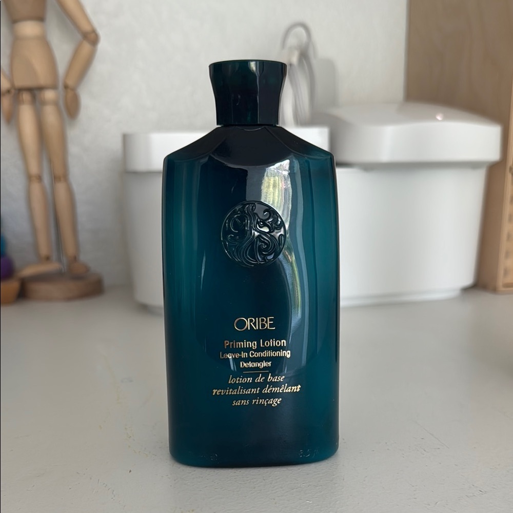 Oribe Priming Lotion Leave-In Conditioner - Deep Teal Bottle